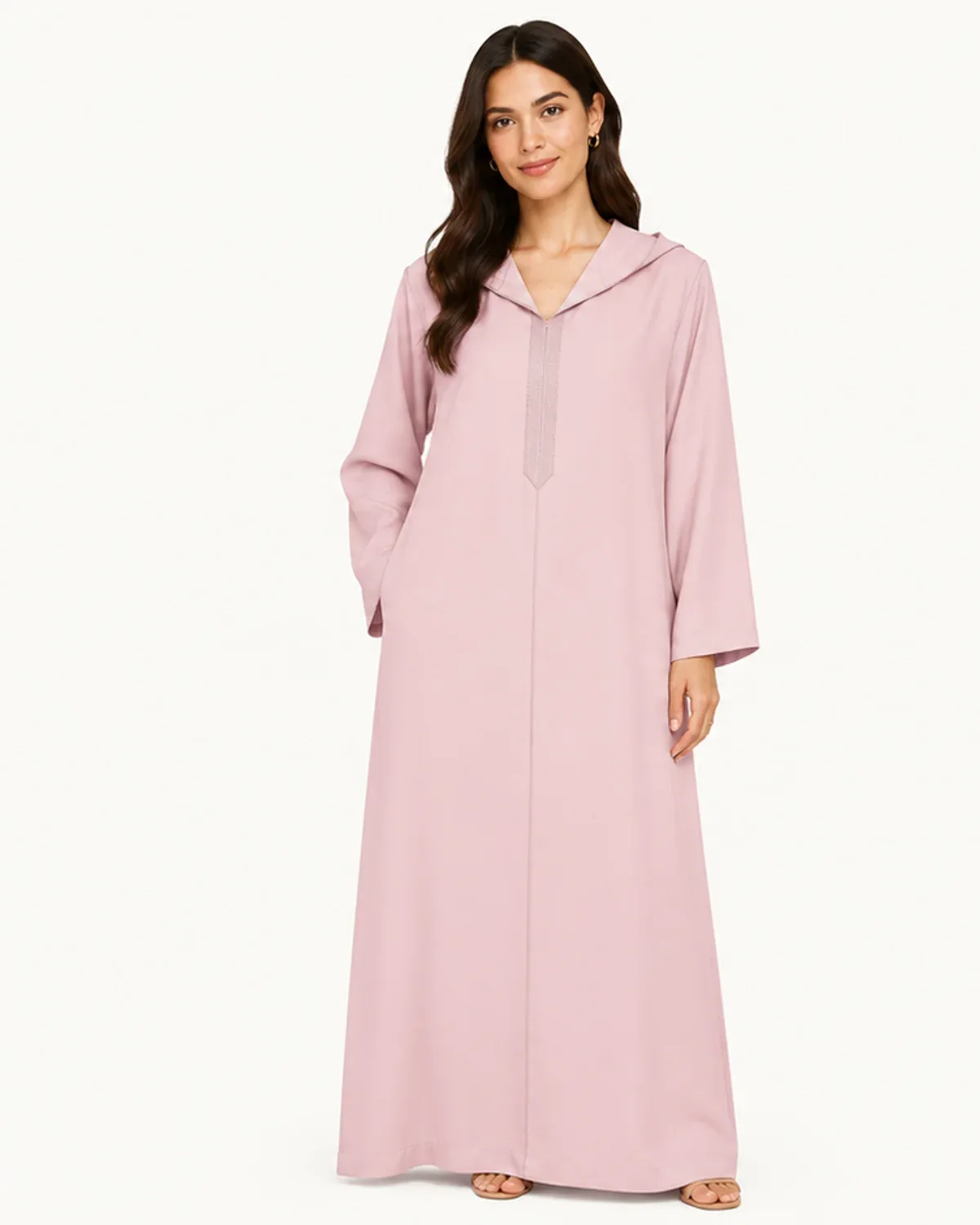 Dusty-pink hooded Moroccan jellaba with tonal embroidered placket, front view on model