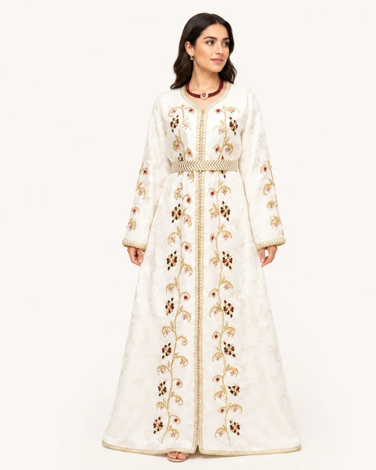 Ivory jacquard Moroccan caftan with gold vine embroidery and chevron belt, front view on model