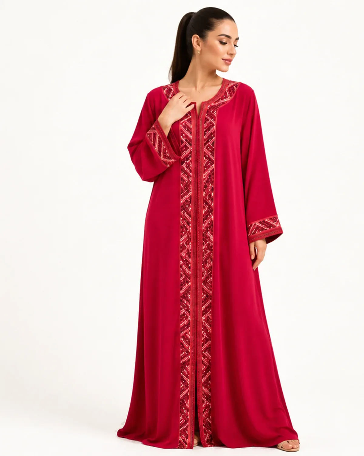 Raspberry-red Moroccan caftan with geometric sequined trim, front view on model