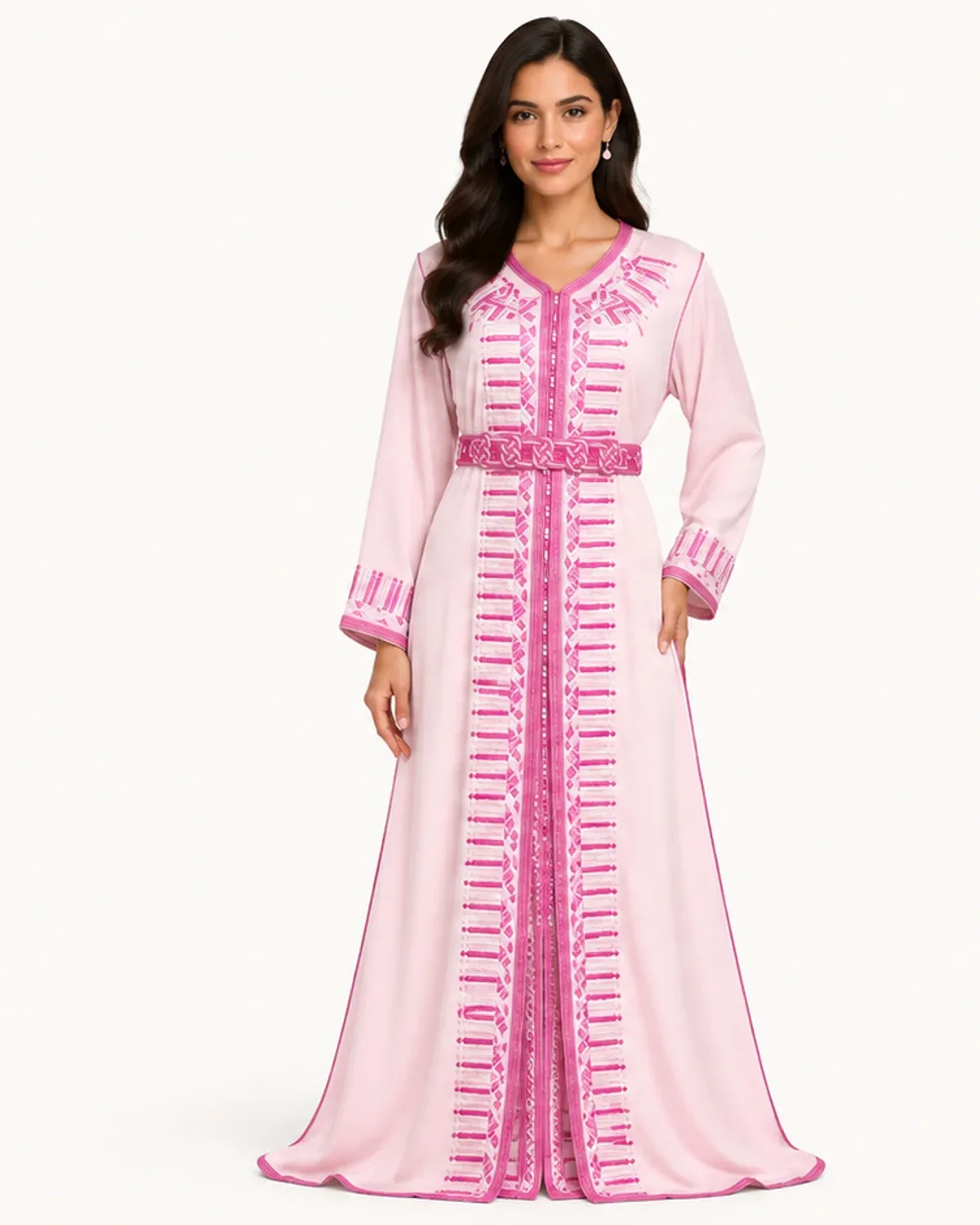 Blush-pink Moroccan takchita with fuchsia banded embroidery and braided mdamma belt, front view on model